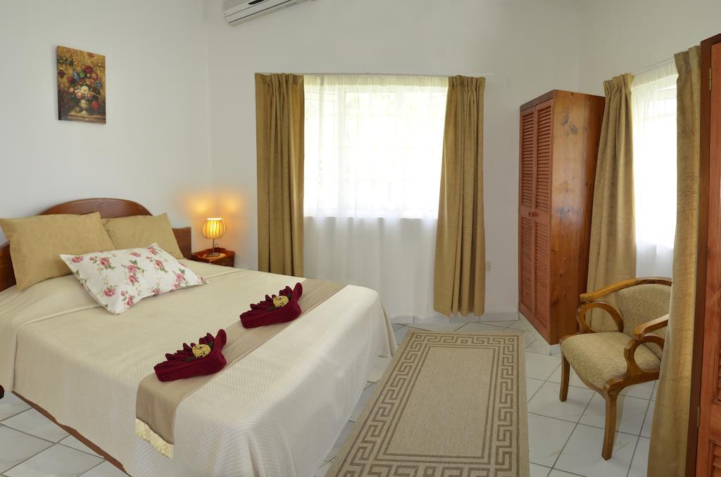 Ixora Villa Anse Royale Szoba fotó