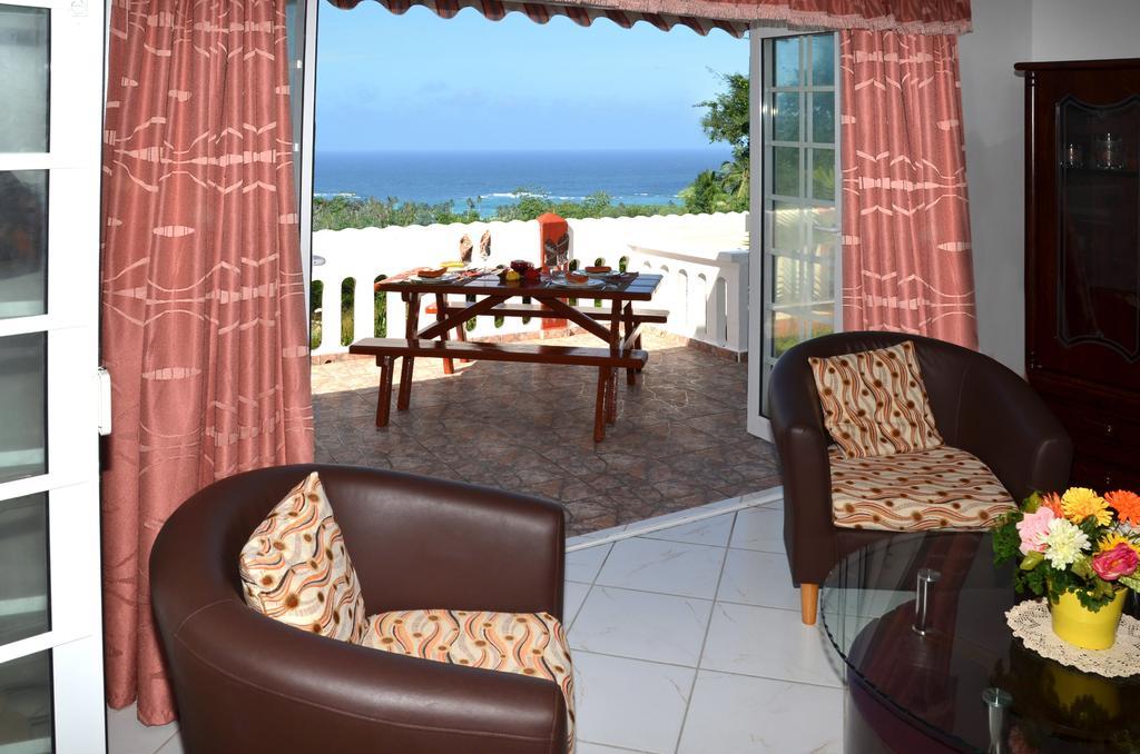 Ixora Villa Anse Royale Szoba fotó