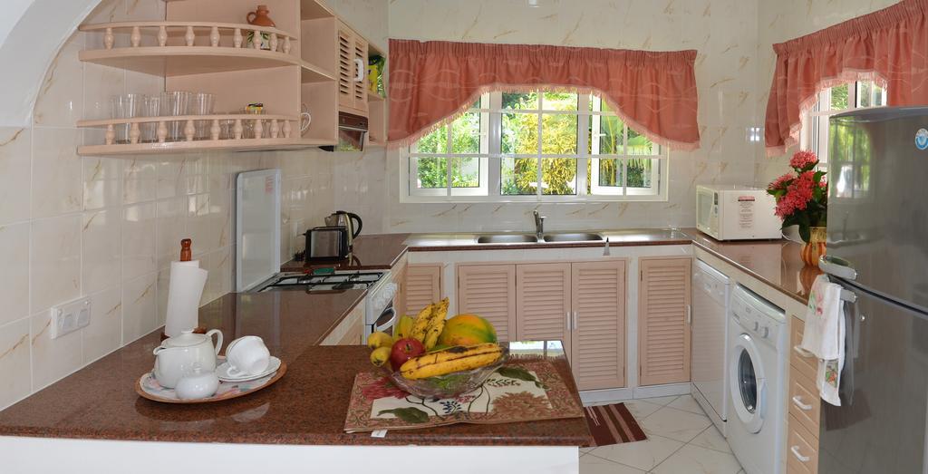 Ixora Villa Anse Royale Szoba fotó